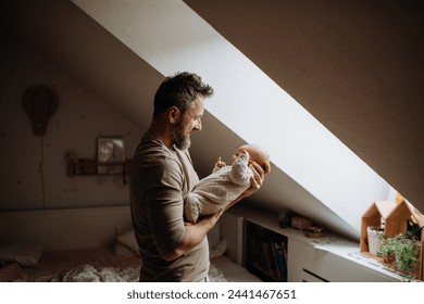 Father holding his newborn baby. Unconditional paternal love, Father's Day concept. - Powered by Shutterstock