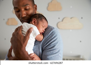 Father Holding Newborn Baby Son In Nursery - Shutterstock ID 627696287