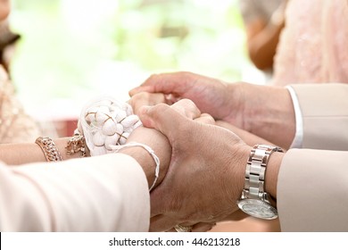 Father Holding Son In Law And Daughter In Thai Tradition Wedding Ceremony