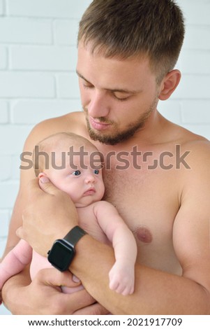 Similar – Image, Stock Photo Baby lying on his back as his doctor examines him during a standard medical checkup