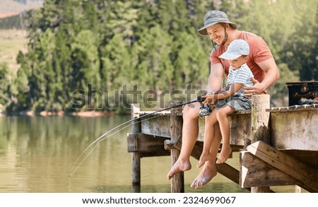 Father, lake and teaching child fishing with rod together for fun bonding, activity or lesson in nature. Happy dad, kid or son relaxing by water or river for learning hobby, catch or fish outdoors