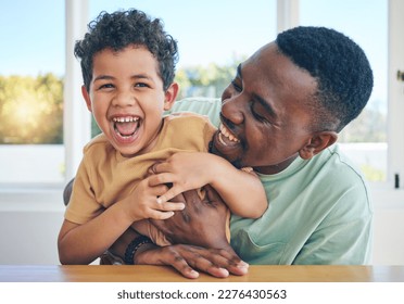 Father, laugh and black man tickle son, have fun and enjoy happy quality time together in Jamaica home. Family bonding, child love and playing African people, youth kid or papa tickling laughing boy - Powered by Shutterstock