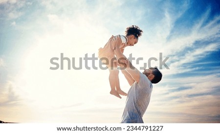 Father lifting kid, air and blue sky with family, travel and freedom outdoor, bonding and ocean with girl and man. Happy people, sunshine and tropical vacation, child flying with dad and adventure