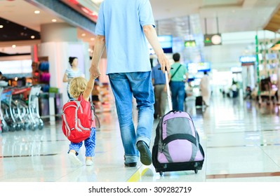 Father And Little Daughter Walking In The Airport, Family Travel