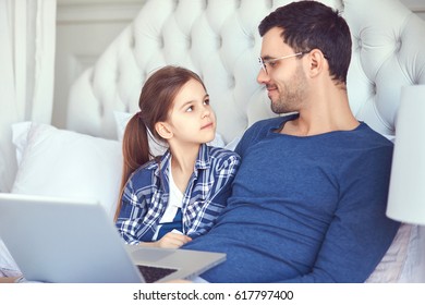 Father is looking at his daughter - Shutterstock ID 617797400