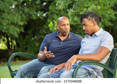 Father Mentoring And Giving Advice To A Younger Man.