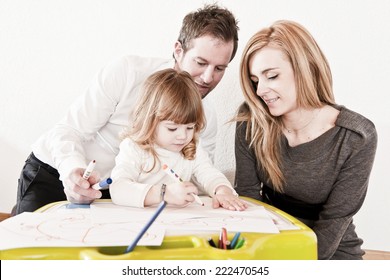 Father Mother Daughter Drawing Together Stock Photo 222470545