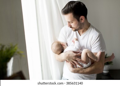 Father And Newborn Baby