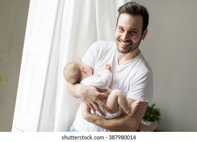 Father And Newborn Baby