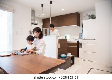 Father And Parents Doing Housework