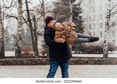 Father Playing With Child Outdoors. Happy Parenting, Family Bond. Toddler Preschool Girl Daughter With Father Lifting Up