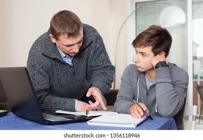 Father Scolds Son For Poor Grades In School