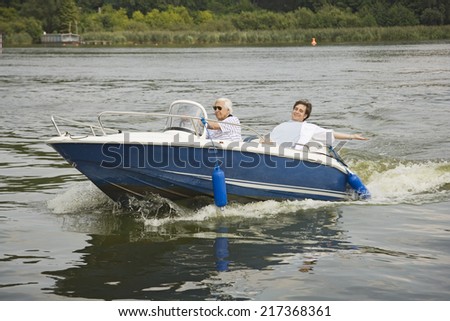 Father and son in boat on the lake