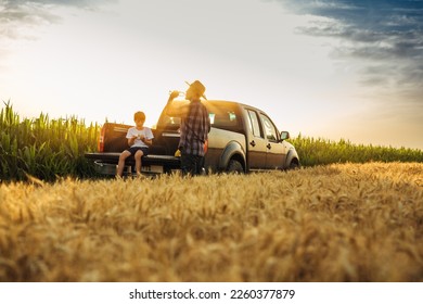 Father and son bonding in the fields