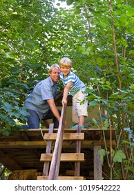 Father And Son Building Treehouse