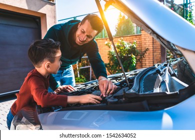 The father and son checking the car