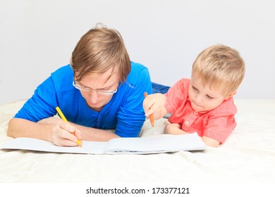 Father Son Drawing Together Early Learning Stock Photo 173377121