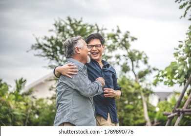 Father And Son, Embracing And Talking Happily, Asian Family