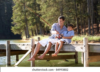 Father And Son Fishing Together