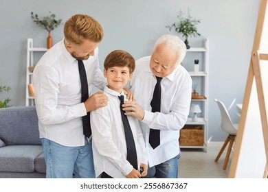 Father, son, and grandfather dress up together and look in the mirror at home on Father Day. They celebrate as a family, sharing this special moment with dad, bonding and enjoying the day together. - Powered by Shutterstock