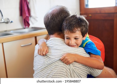 Father And Son Hug Goodbye Before School Love And Affectionate Embrace