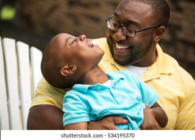 Father And Son Laughing.