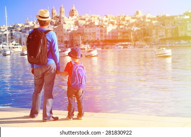 Father And Son Looking At City Of Valetta, Malta, Family Travel