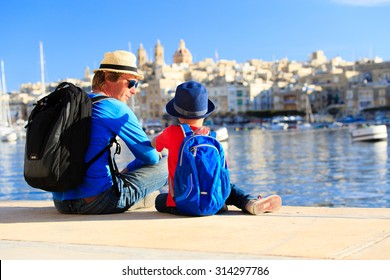 Father And Son Looking At City Of Valetta, Malta, Family Travel