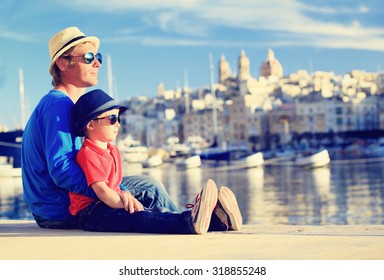 Father And Son Looking At City Of Valetta, Malta, Family Travel