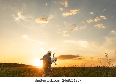 Father and son play together in the sun. Spending time with the child. Dad and son. Happy Father's Day. Paternity. - Powered by Shutterstock