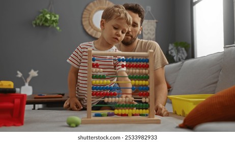 Father and son playing with an abacus indoors in a cozy living room, showcasing family love, childhood development, and educational activities in a home environment - Powered by Shutterstock