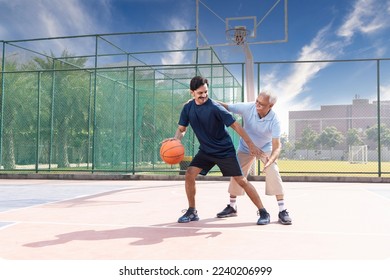 Father and son playing basketball. - Powered by Shutterstock