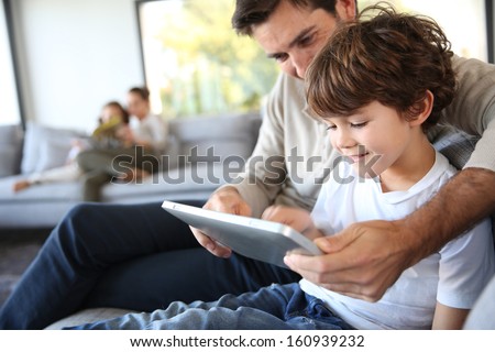 Similar – Image, Stock Photo boy Parenting Education