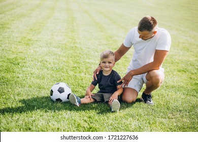 Father Son Playing Football Field Stock Photo (Edit Now) 1721227624