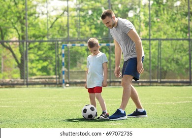 Father Son Playing Football On Soccer Stock Photo 697072735 | Shutterstock