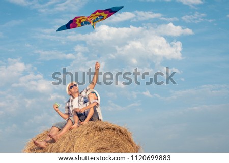 Similar – Image, Stock Photo Father and son playing in the park