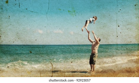 father and son playing together on the beach. Photo in old image style. - Shutterstock ID 92923057
