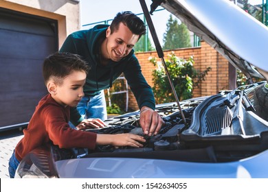 The father and son repair a car