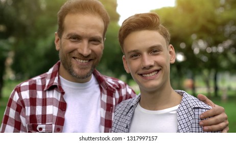 Father And Son Smiling And Looking At Camera, Teeth Health, Dentalcare Whitening