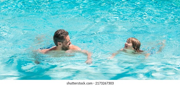 Father And Son In Swimming Pool, Banner With Copy Space. Summer Holidays Weekend At Family Day. Dad And Child Having Fun At Pool Party.