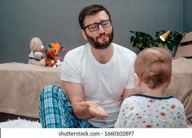 Father And Son. Father Teaches A Child To Walk On A Potty. Father Parachutes At The Son. Dad Waits. The Child Is Playing. Baby Toiletries. Potty Training.baby