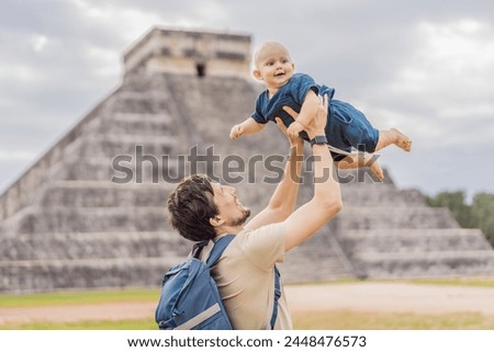 Father and son tourists observing the old pyramid and temple of the castle of the Mayan architecture known as Chichen Itza these are the ruins of this ancient pre-columbian civilization and part of
