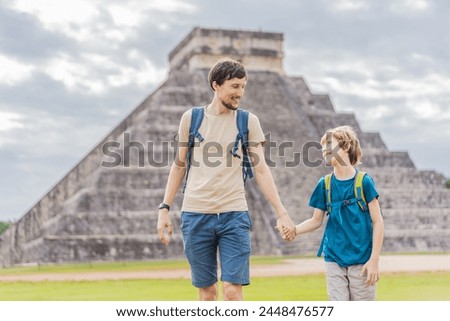 Father and son tourists observing the old pyramid and temple of the castle of the Mayan architecture known as Chichen Itza these are the ruins of this ancient pre-columbian civilization and part of
