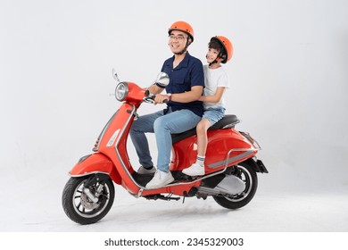 father and son wearing helmets and riding motorbikes - Powered by Shutterstock