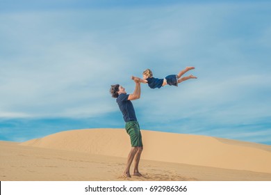 Father and son at the white desert. Traveling with children concept.