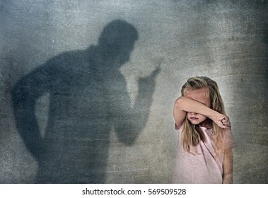father or teacher shadow screaming angry reproving misbehavior to young sweet little schoolgirl or daughter with beautiful blonde hair sad intimidated looking scared and guilty isolated 