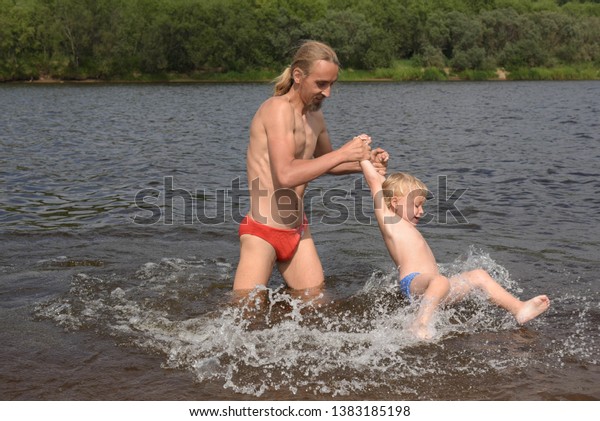 boy swimming in river