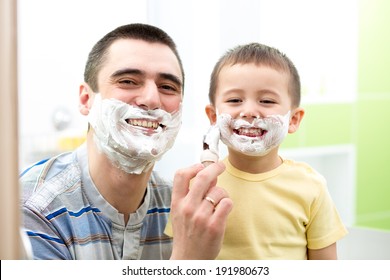 Father Teaching His Son Boy How To Shave