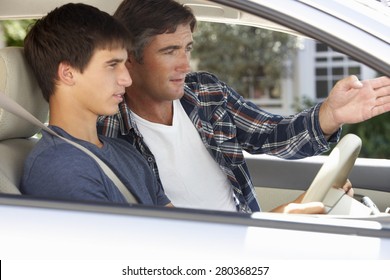 Father Teaching Teenage Son To Drive - Powered by Shutterstock