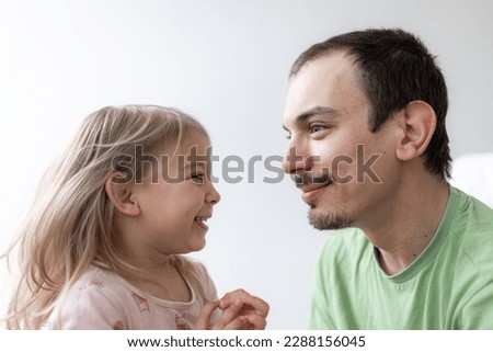 father and toddler daughter cheerful portreit, tenderness family relationship. . Fathers day 